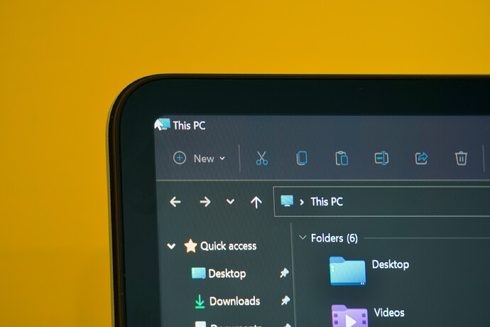 Windows 11 on the Laptop Studio's screen. The rounded corner obscures part of the mouse pointer, and it encroaches on the title bar icon, too.