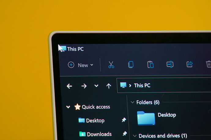 Here's Windows 11 on a typical square-cornered screen. The mouse pointer is all the way in the top-left corner of the screen, and it's still fully visible.