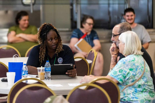 A FEMA worker attends claims by local residents after being affected by floods following the passing of Hurricane Helene, in Marion, North Carolina, U.S., October 5, 2024. REUTERS/Eduardo Munoz A FEMA worker attends claims by local residents after being affected by floods following the passing of Hurricane Helene, in Marion, North Carolina, U.S., October 5, 2024. REUTERS/Eduardo Munoz