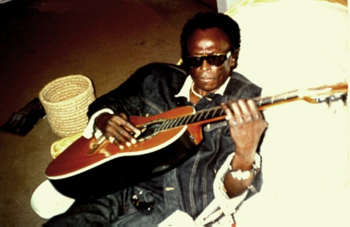 May be an image of 1 person and guitar