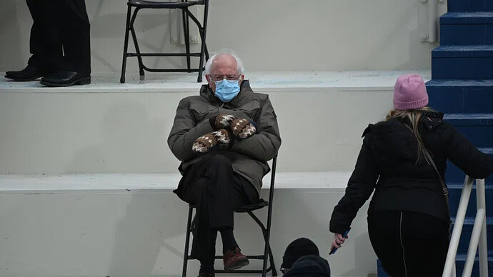 bernie_wearing_mittens