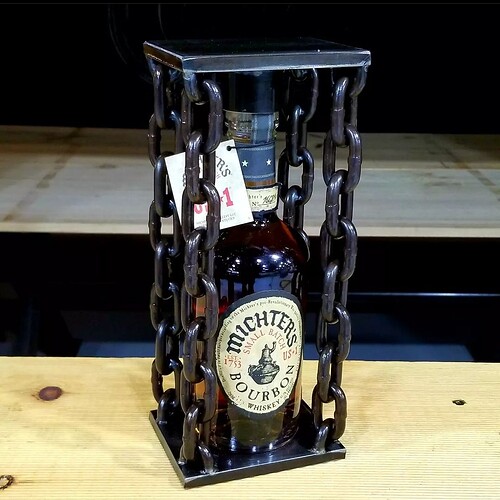 Whiskey Bottle cage gift by Kyle Voss