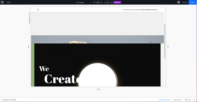 This is a screenshot of a webpage under development using Figma, with a partially visible banner image displaying the text "We Create" over a background image of an archway and an empty window grid. (Captioned by AI)